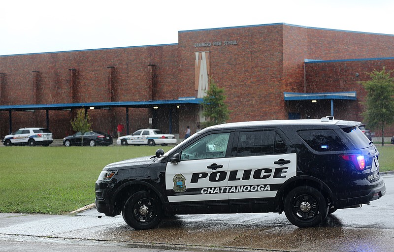 A Chattanooga Police vehicle blocks the entrance to Brainerd High School Wednesday, September 26, 2018 in Brainerd, Tennessee. The school was on a lockdown for several hours and several students were tended to and K-9 units performed a sweep of the school.