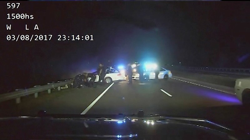 A federal complaint has been filed against a number of area law enforcement officers and government agencies after a March 2017 vehicle pursuit took a violent turn, leading to a beating so severe one of the suspect's testicles was ruptured. (Screenshot of dash camera footage/Hamilton County Sheriff's Office)