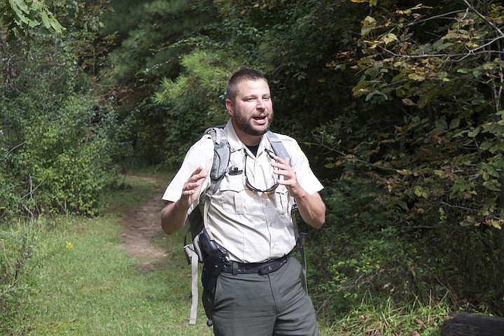 Staff photo by Mark Pace/Chattanooga Times Free Press — Park ranger Anthony Jones gives instruction prior to the first public hike on the Soak Creek Trail. The trail is the newest section of the Cumberland Trail system.