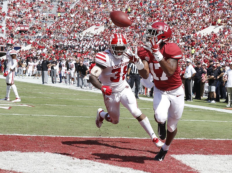 Alabama freshman receiver Jaylen Waddle had two touchdown catches and a 63-yard punt return for a score in Saturday's 56-14 dismantling of Louisiana.