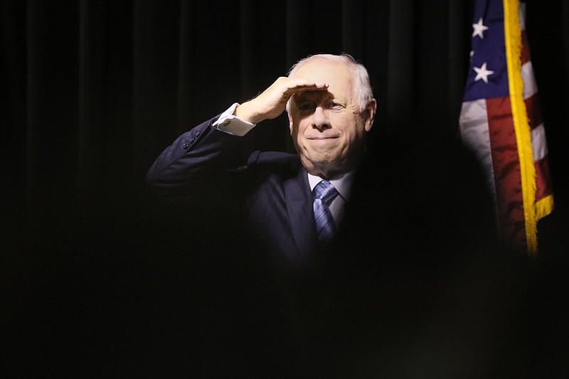 Staff photo by Erin O. Smith / 
Democrat Phil Bredesen shades his eyes from the spotlight as he looks out over the crowd of people that came for his ideas forum Monday, October 1, 2018 at the Bessie Smith Cultural Center in Chattanooga, Tennessee. Bredesen held the event after his opponent for the U.S. Senate seat, Marsha Blackburn, turned down a debate to be held in Chattanooga the same night.