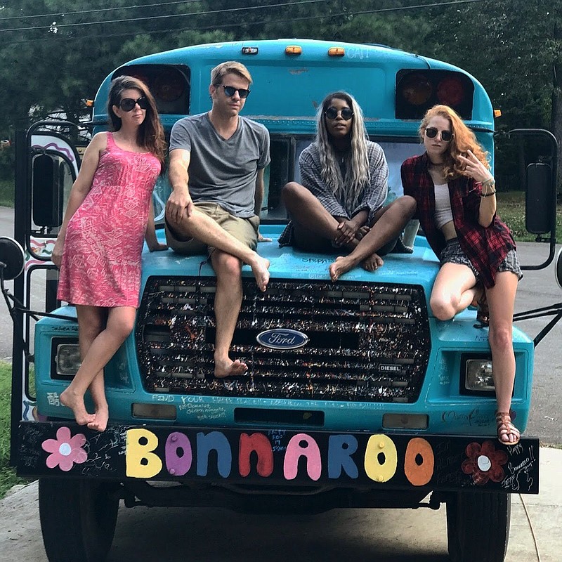 Friends Sharla and Daniel Horton, Brooklin Johnson and Chelsey Ray are so passionate about Bonnaroo, they bought the Roo Bus from some other fans who created it out of a former prison bus several years ago. (Photo from Daniel Horton)