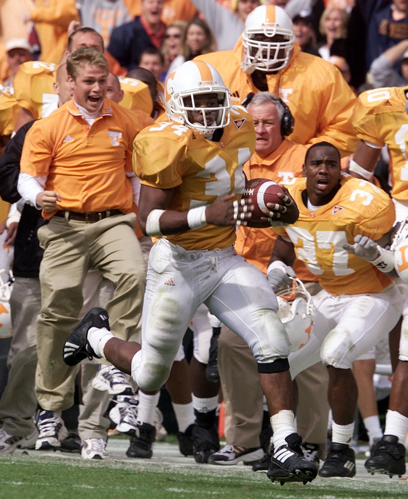 Tennessee's Travis Stephens runs for a go-ahead touchdown during the Vols' 2001 game against Georgia in Knoxville. Stephens was pivotal to the Vols' 1998 win against Georgia in Athens, rushing for 107 yards on 20 carries as fourth-ranked Tennessee beat the seventh-ranked Bulldogs 22-3.