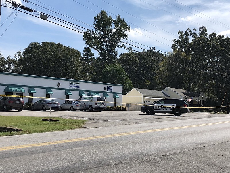 A Chattanooga Police Department patrol vehicle is parked in front of a business in the 1040 block of Graysville Road where a man was injured in a shooting Wednesday morning.