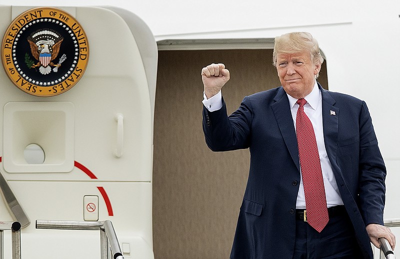 President Donald Trump arrives at Minneapolis/St. Paul Airport Airport Air Reserve Station, 934th Airlift Wing, on Air Force One on Thursday. (Carlos Gonzalez/Star Tribune via AP)