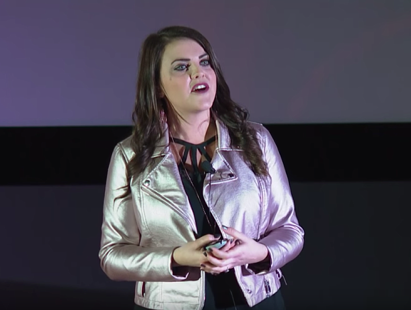 This image from video shows NoBaked Cookie Dough founder Megan Beaven (now Megan Feeman) speaking  during a 2018 TEDx Talk.