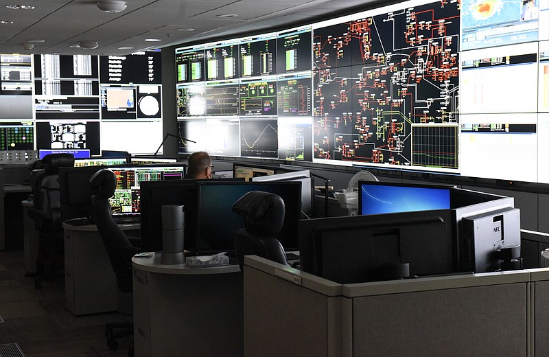 TVA workers control and monitor the system's electric grid at the TVA power operations center Thursday, Aug. 27, 2015, in Chattanooga, Tenn. 