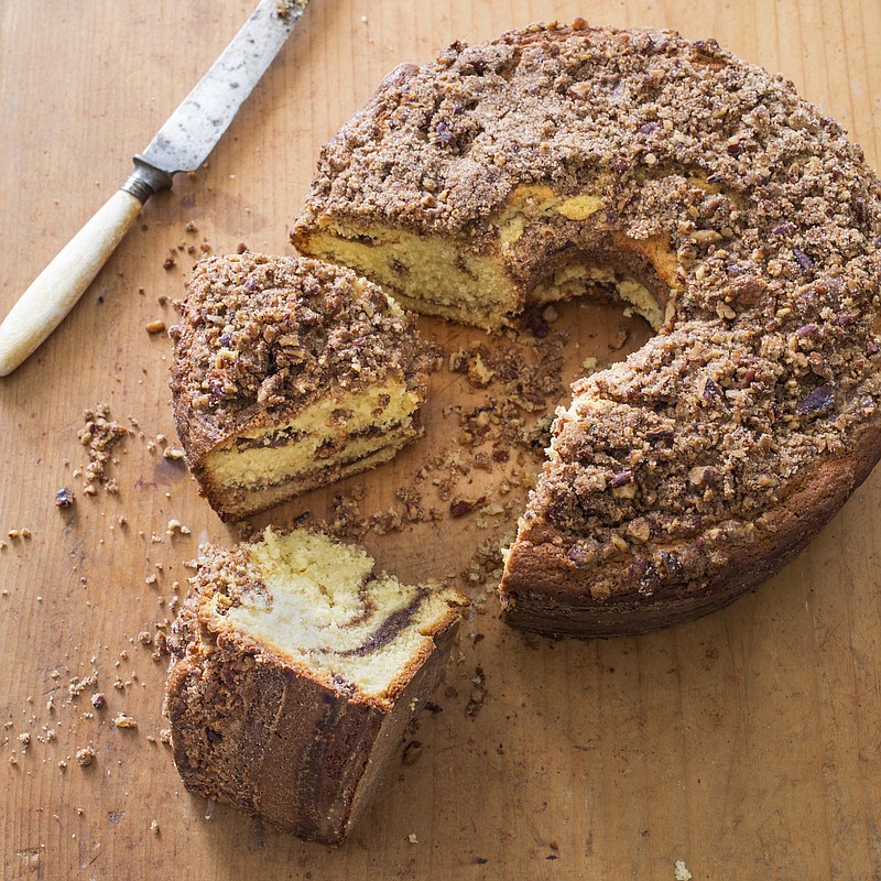 This undated photo provided by America's Test Kitchen in September 2018 shows a sour cream coffee cake in Brookline, Mass. This recipe appears in the cookbook "All-Time Best Brunch." (Carl Tremblay/America's Test Kitchen via AP)