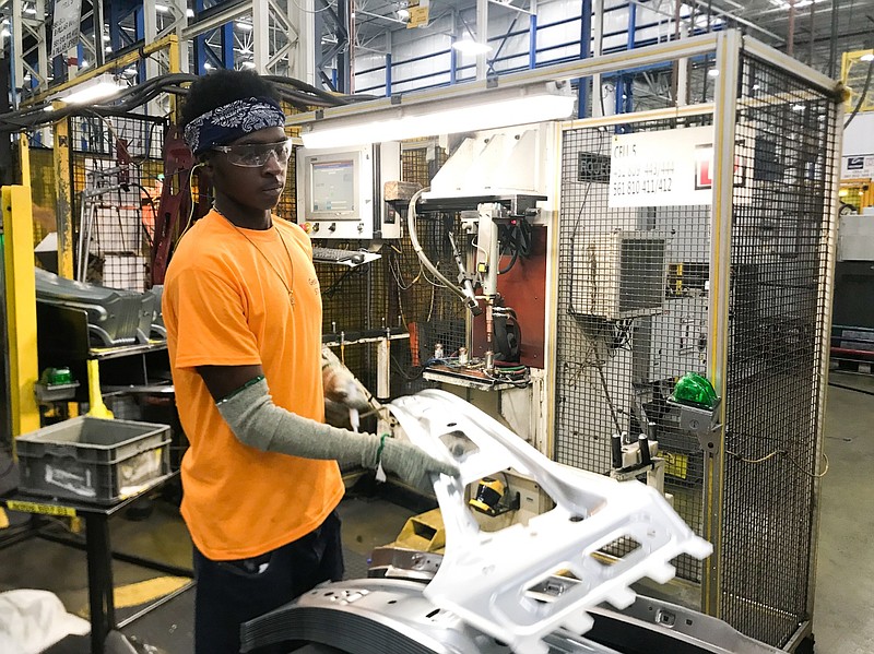 Javontae Jones, a senior from Central High School, works on the production floor at Gestamp. Gestamp and Hamilton County Schools joint work-based learning program recently earned a	U.S. Department of Labor designation as a registered apprenticeship. Photo courtesy of Hamilton County Schools. Contributed Photo / Times Free Press