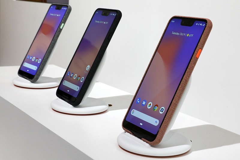 New Google Pixel 3 smartphones are displayed in New York, Tuesday, Oct. 9, 2018. Google introduced two new smartphones in its relentless push to increase the usage of its digital services and promote its Android software that already powers most of the mobile devices in the world.(AP Photo/Richard Drew)