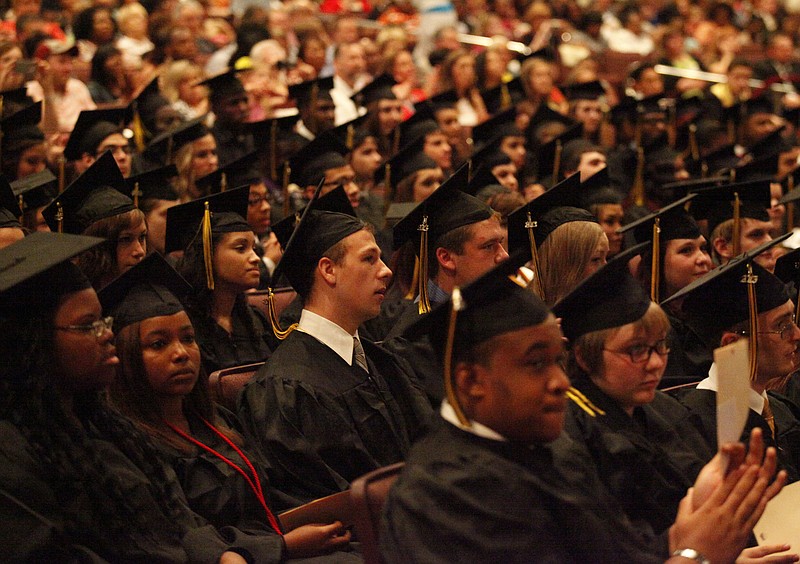 Hixson High School graduating seniors listen to a speaker during their commencement ceremony several years ago at Memorial Auditorium.