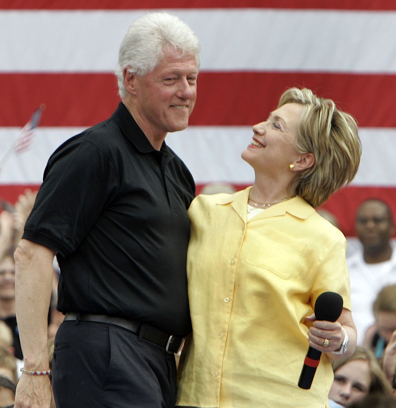 Former President Bill Clinton, left, and his wife, Hillary Clinton, are preparing to launch a 13-city tour.