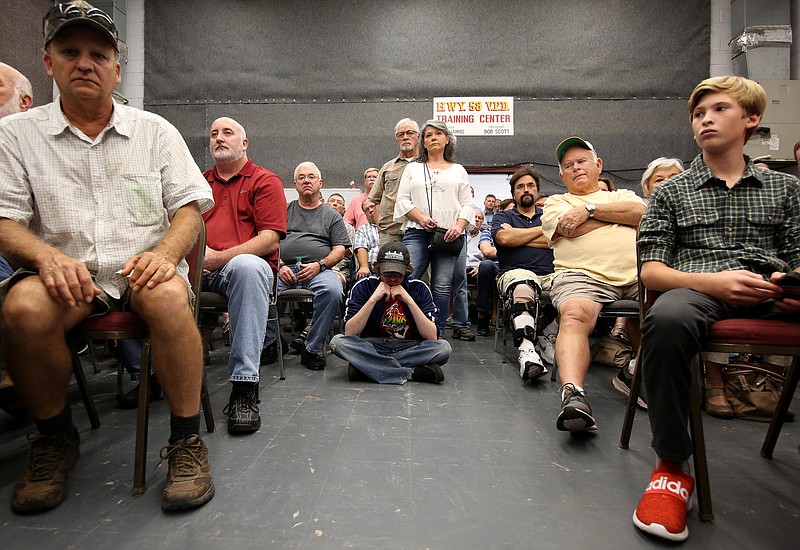 The Fire Department Training Center in Ooltewah, Tennessee, is completely full of residents who do not want a sewer plant built in their community during a Water and Wastewater Treatment Authority public meeting held Thursday, October 11, 2018. The room was filled from wall to wall with chairs, and individuals were peeking in from all doors to listen to what was happening during the meeting.