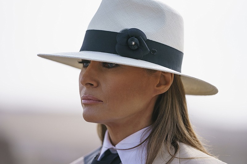 In this Oct. 6, 2018, photo, First lady Melania Trump pauses as she speaks to media during a visit to the historical Giza Pyramids site near Cairo, Egypt. First lady Melania Trump says she thinks she's among the most bullied people in the world and there are people in the White House she and President Donald Trump can't trust. (AP Photo/Carolyn Kaster)