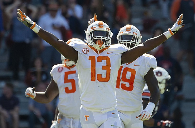 Tennessee linebacker Deandre Johnson celebrates after his fourth-down sack of Auburn's Jarrett Stidham during the second half of Saturday's game in Auburn, Ala.