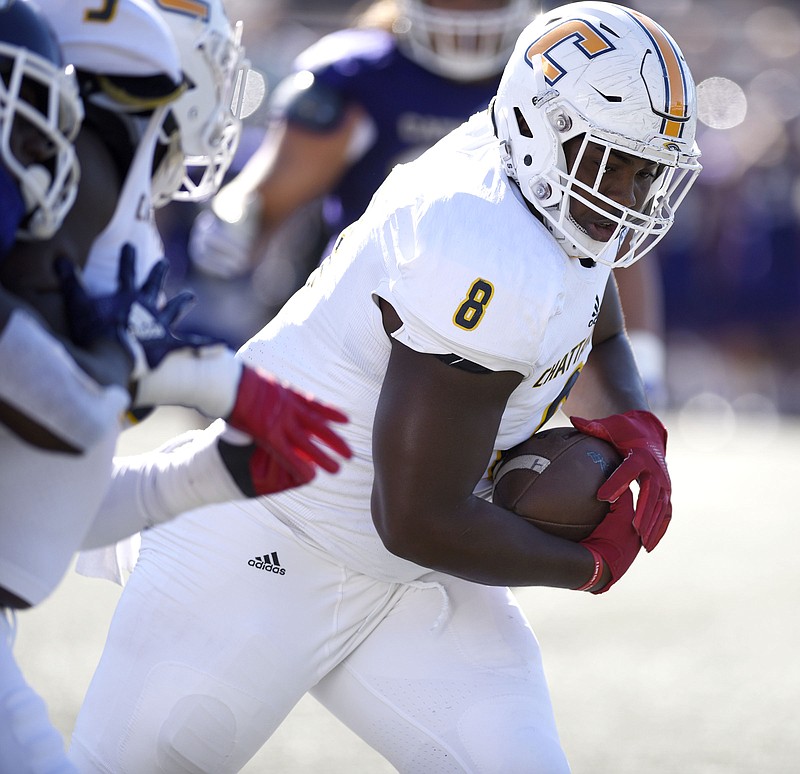 UTC defensive lineman Isaiah Mack returns a fumble during the Mocs' game at Western Carolina in October 2018.