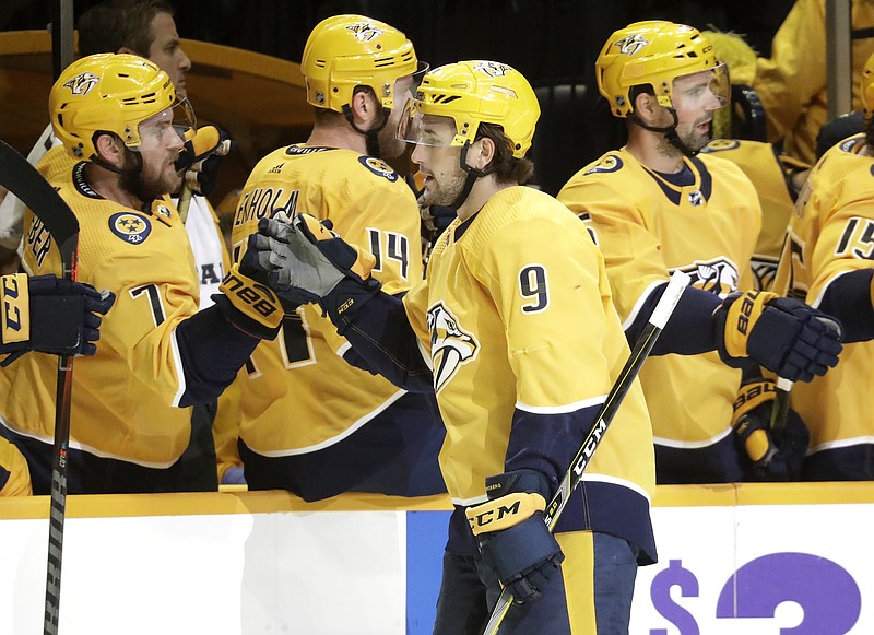 Nashville Predators left wing Filip Forsberg is congratulated after scoring a goal against the New York Islanders during the first period of Saturday night's game in Nashville.