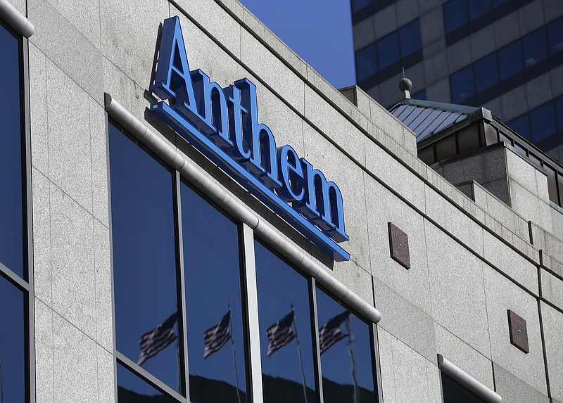 FILE - In this Feb. 5, 2015, file photo, the Anthem logo hangs at the health insurer's corporate headquarters in Indianapolis. Federal officials say the nation’s second-largest health insurer will pay the government a record $16 million to settle potential violations of privacy requirements in a 2015 case that still stands the biggest health care hack in U.S. history.    (AP Photo/Michael Conroy, File)