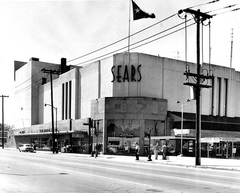 This March 1, 1959, file photo shows a Sears building in downtown Houston. Sears has filed for Chapter 11 bankruptcy protection Monday, Oct. 15, 2018, buckling under its massive debt load and staggering losses. The company once dominated the American landscape, but whether a smaller Sears can be viable remains in question. (Houston Chronicle via AP, File)