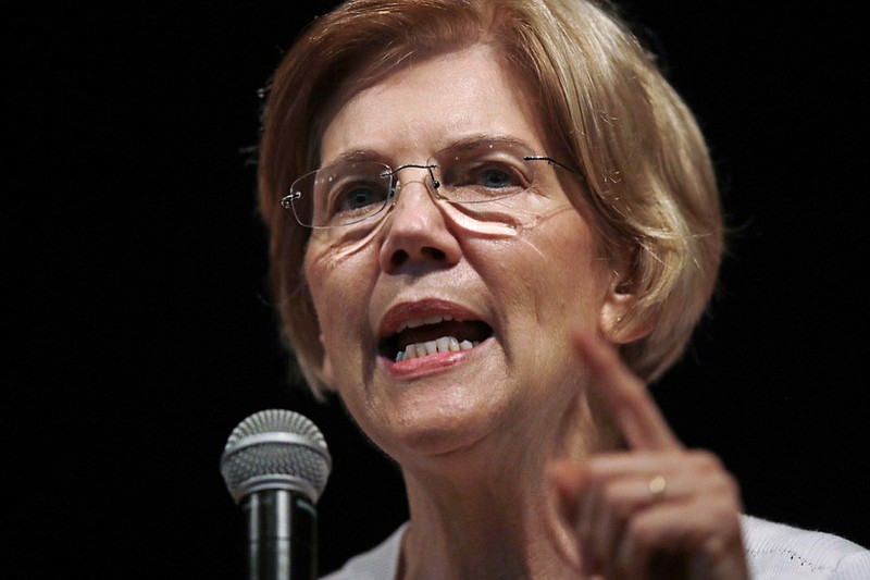 In this Wednesday, Aug. 8, 2018, file photo, U.S. Sen. Elizabeth Warren, D-Mass., speaks during a town hall-style gathering in Woburn, Ma. A DNA analysis done on Sen. Warren provides strong evidence she has Native American heritage. She provided her test results to The Boston Globe for a story published Monday. (AP Photo/Charles Krupa, File)