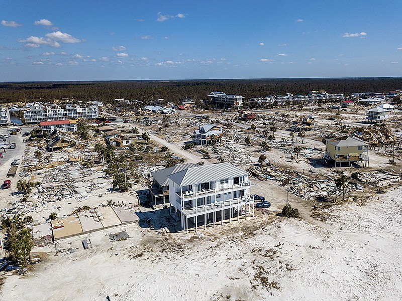 The home Russell King and his nephew Lebron Lackey had built to withstand 250-mph winds in Mexico Beach, Fla., Oct. 14, 2018. When The New York Times published anÊanalysis of aerial images showing a mile-long stretch of Mexico Beach where at least three-quarters ofÊtheÊbuildings were damaged by Hurricane Michael, King and Lackey saw their ÒSand PalaceÓ still standing, majestic, amid the apocalyptic wreckage. (Johnny Milano/The New York Times)