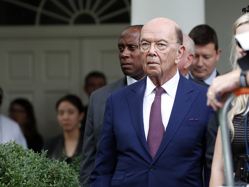 FILE - In this Wednesday, July 25, 2018 file photo, Commerce Secretary Wilbur Ross stands in the Rose Garden of the White House, in Washington. U.S. Secretary of Commerce Wilbur Ross is criticizing the EU for moving too slowly in trade talks. “We really need tangible progress. The president’s patience is not unlimited,” Ross told reporters in Brussels, a day after talks with EU Trade Commissioner Cecilia Malmstrom on Tuesday, Oct. 16.  (AP Photo/Alex Brandon, file)