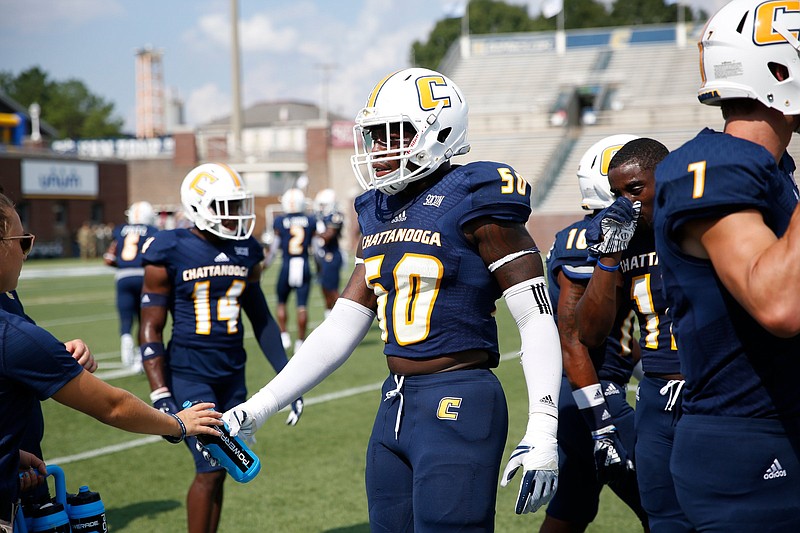 UTC linebacker Ian Hayes (50), a former walk-on, has made an impact this season as a redshirt junior. With injuries to defensive players allowing him more playing time, he has taken advantage of the opportunity.