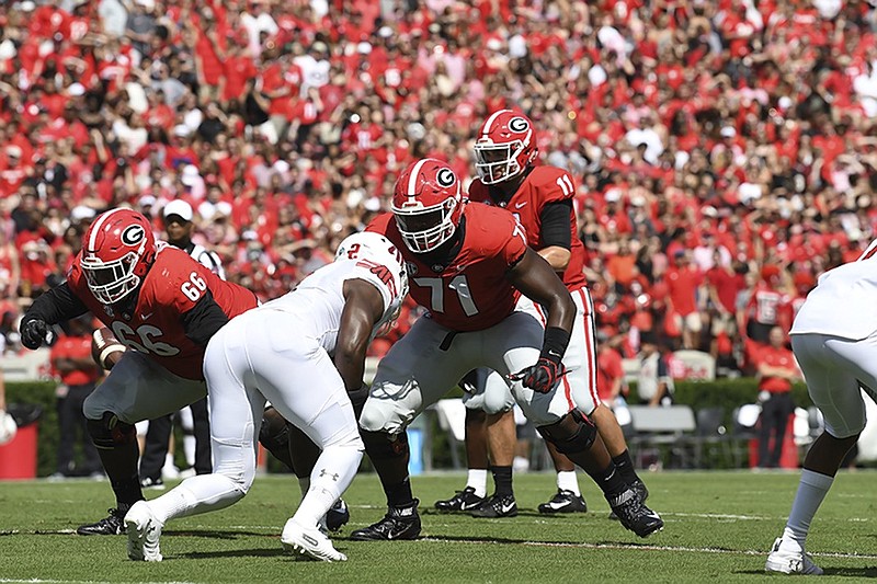 Georgia left tackle Andrew Thomas (71) gets ready to protect quarterback Jake Fromm during the Bulldogs' 45-0 season-opening win over Austin Peay on Sept. 1 in Athens.