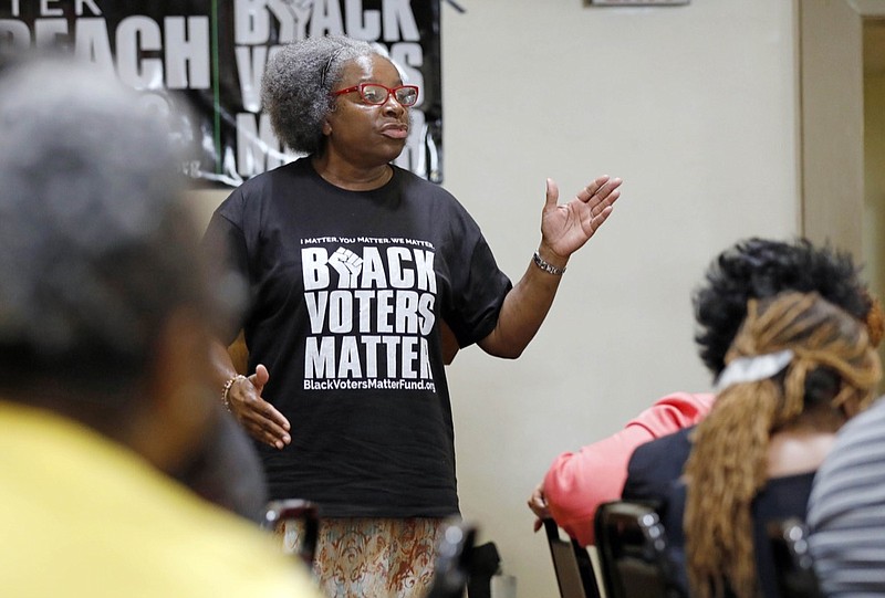 In this Aug. 24, 2018 photo, Betty L. Petty of Sunflower County Parents and Students United, addresses a meeting of the Black Voters Matter Fund and several Mississippi grassroots organizations at MACE, Mississippi Action for Community Education, headquarters in Greenville, Miss. Democrats and Democratic-affiliated groups are making strategic shifts to ensure that in November the party avoids a problem that has bedeviled it in years past: low turnout in off-year elections. (AP Photo/Rogelio V. Solis)