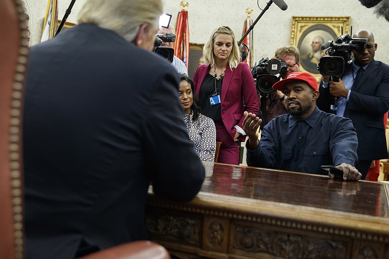 Musician Kanye West speaks with President Donald Trump during a meeting in the Oval Office of the White House on Oct. 11, 2018, in Washington. (AP Photo/Evan Vucci)