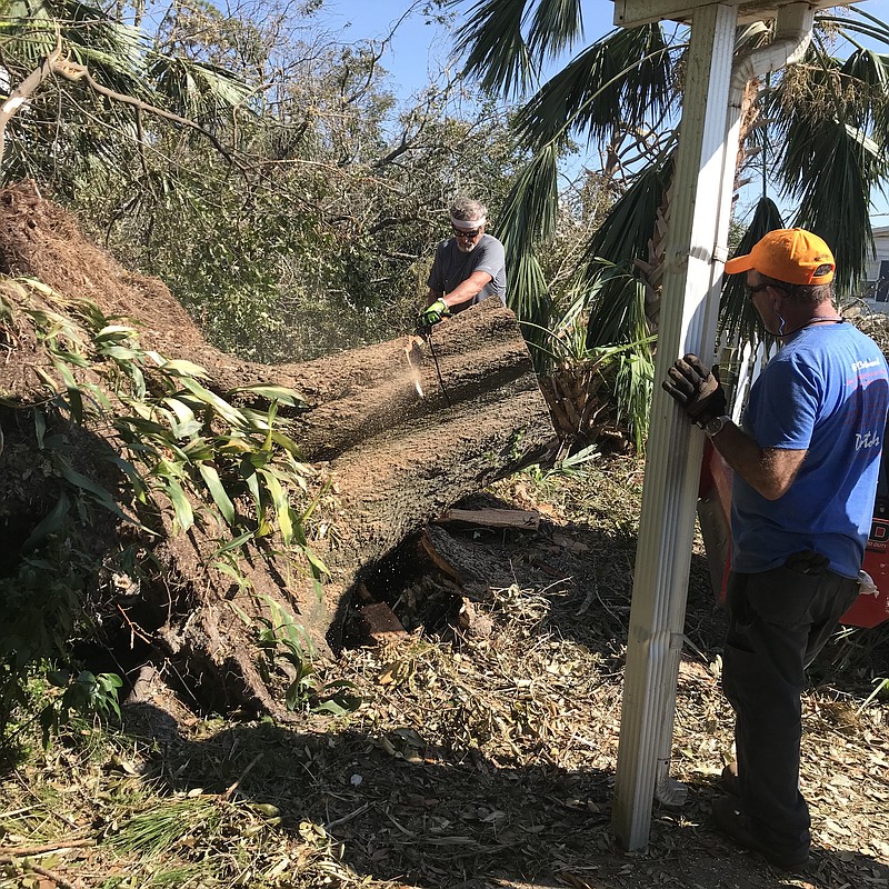 Local volunteers cut trees that fell in the Panama City, Fla., area when Hurricane Michael made landfall. Two teams from Ooltewah and Cleveland went to the Florida Panhandle last week to provide disaster relief assistance in the aftermath of the storm.