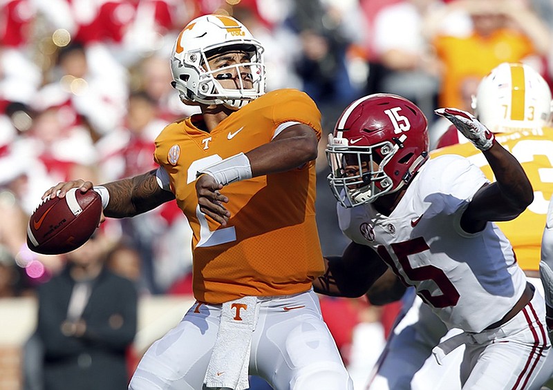 Alabama defensive back Xavier McKinney closes in on Tennessee quarterback Jarrett Guarantano during Saturday's game at Neyland Stadium. Guarantano fumbled after McKinney's hit, and Alabama's Christian Miller recovered the ball on the Vols' 3-yard line to set up a touchdown.