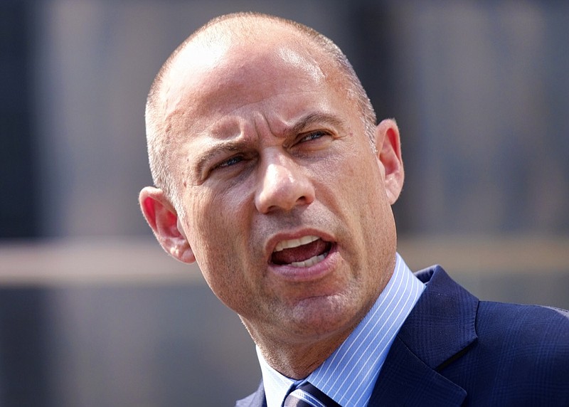 FILE - In this July 27, 2018, file photo Michael Avenatti, talks to the media during a news conference in front of the U.S. Federal Courthouse in Los Angeles. A California judge on Monday, Oct. 22, ordered Avenatti to pay $4.85 million to an attorney at his former law firm. (AP Photo/Richard Vogel, File)

