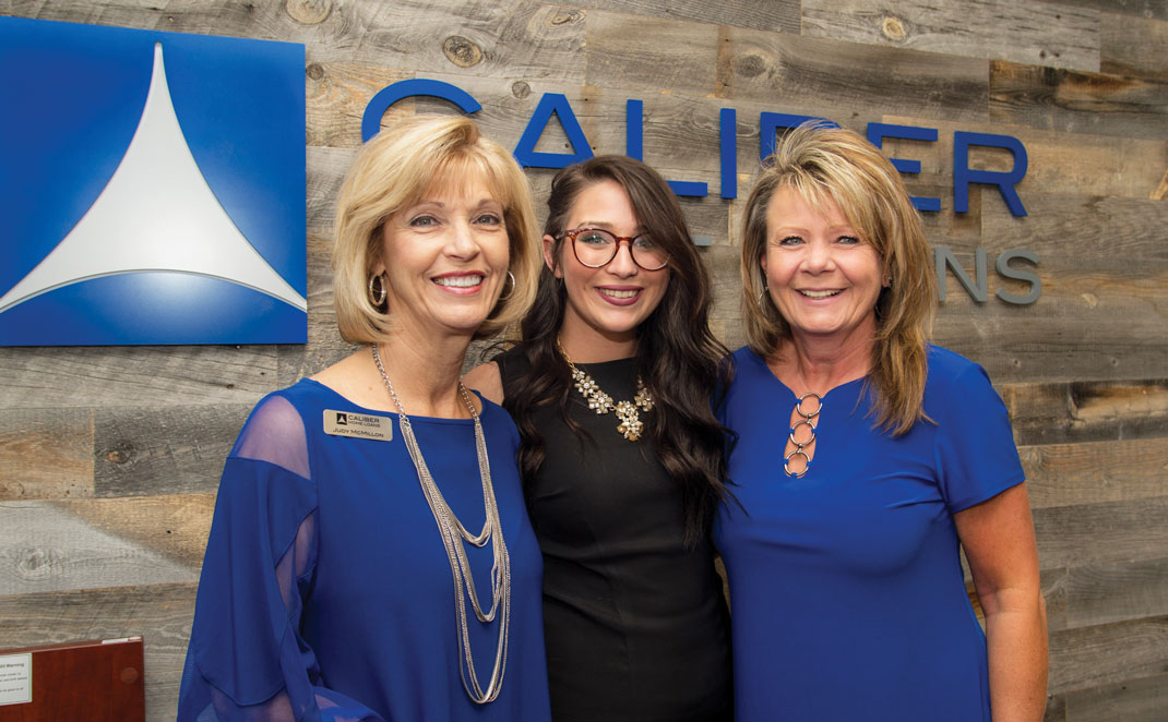Judy McMillon, Taylor Doremus and Cheryl Owens attend an opening party for Caliber Home Loans' new office.
