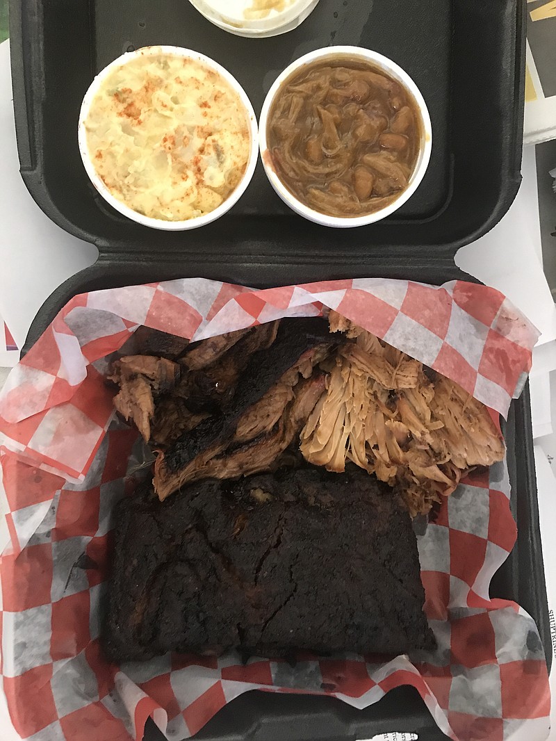 The combo plate I chose featured brisket, pulled pork and a slab of ribs, plus baked beans and potato salad. I was able to eat about half and saved the rest for later.