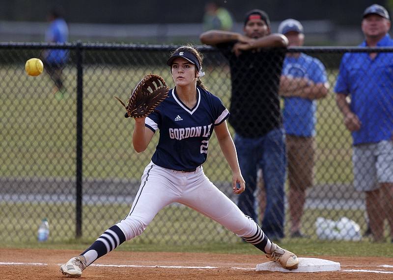 Gordon Lee's Emma Minghini stretches out to make a catch at first base during a game at Trion on Sept. 6. Gordon Lee is going for its fourth straight GHSA softball state championship, but rival Trion is among the competition in Columbus starting today at the state tournament.