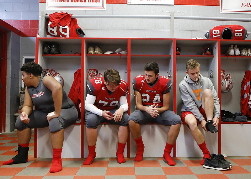 From left, Ooltewah football players Hunter Smith, Gage Harris, Jason Tabor and Tyler Bradford get ready before their home game against Cleveland on Oct. 19.