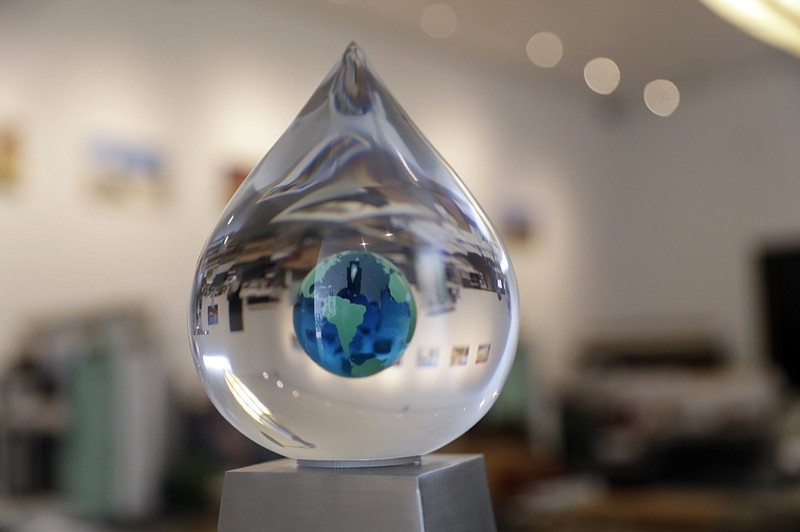 The XPrize trophy is seen at The Skysource/Skywater Alliance offices Wednesday, Oct. 24, 2018, in Los Angeles. The company received the $1.5 million XPrize For Water Abundance for developing the Skywater 300, a machine that makes water from air. (AP Photo/Marcio Jose Sanchez)

