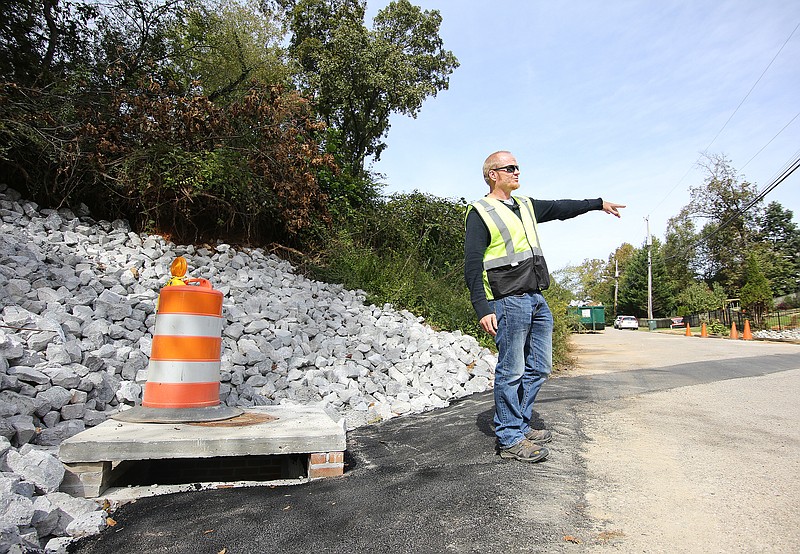 Jeremy Swilley, the construction program supervisor for the City of Chattanooga, points out drainage areas that have been added along Knickerbocker Avenue Tuesday, October 23, 2018 in Chattanooga, Tennessee. A large portion of complaints by residents about new developments causing drainage problems comes from St. Elmo and North Chattanooga.