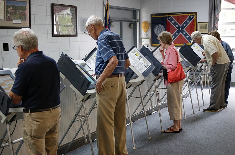 Voters cast their ballots at the Chickamauga Civic Center on Tuesday, May 22, 2018, in Chickamauga, Ga. Turnout was steady at the polling place for Georgia's Tuesday primary election.