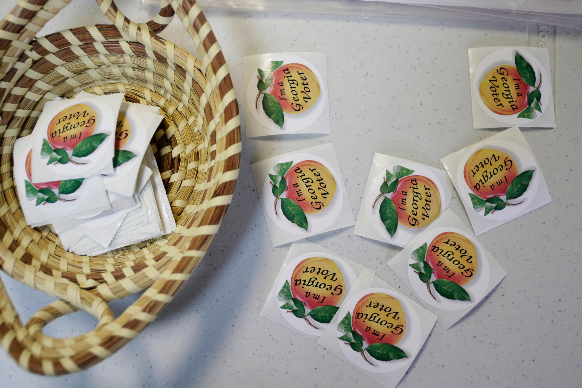 Voting stickers are ready to be taken by voters at the Chickamauga Civic Center on Tuesday, May 22, 2018, in Chickamauga, Ga. Turnout was steady at the polling place for Georgia's Tuesday primary election.