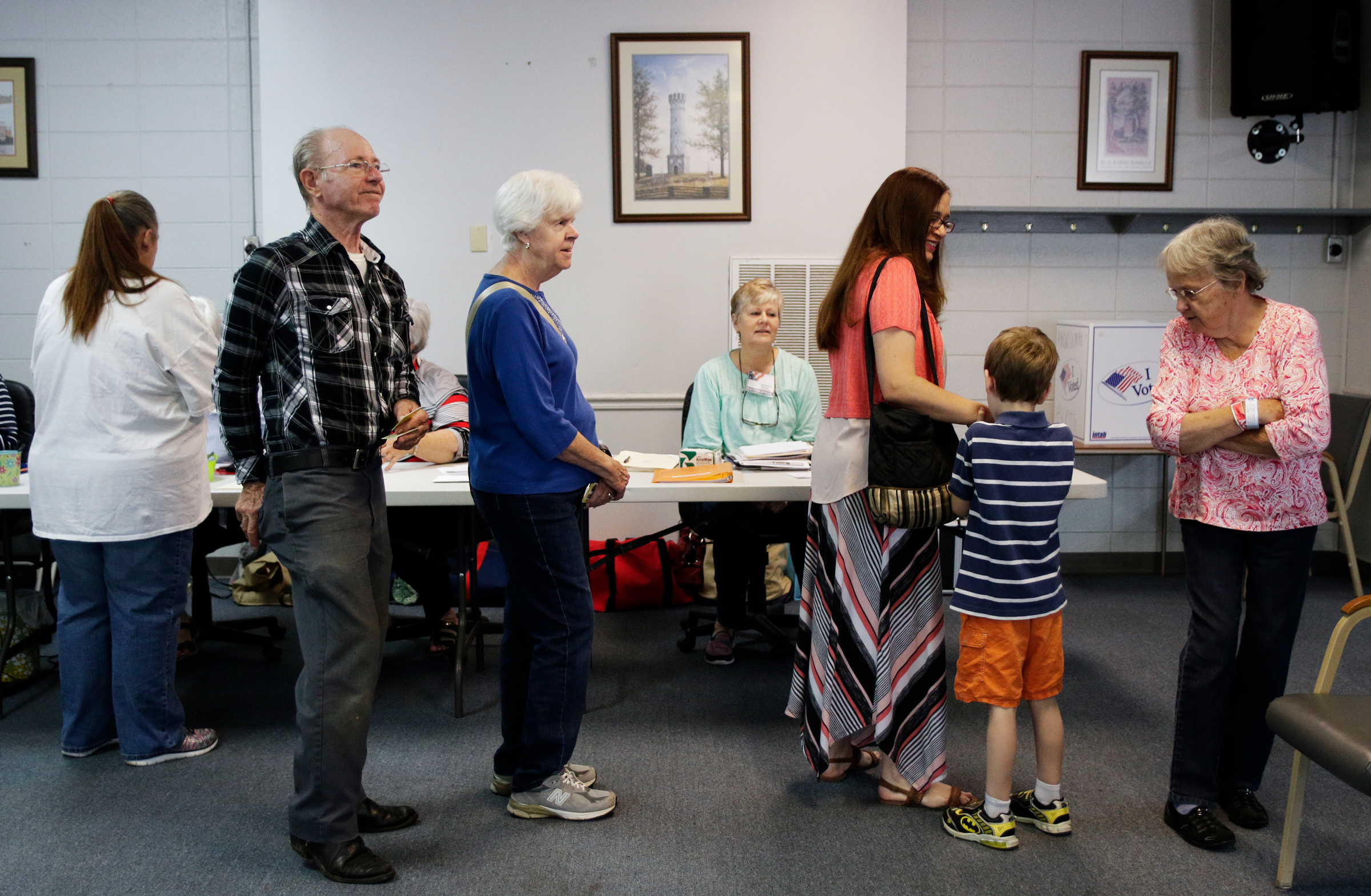 Voters wait in line to cast their ballots at the Chickamauga Civic Center on Tuesday, May 22, 2018, in Chickamauga, Ga. Turnout was steady at the polling place for Georgia's Tuesday primary election.