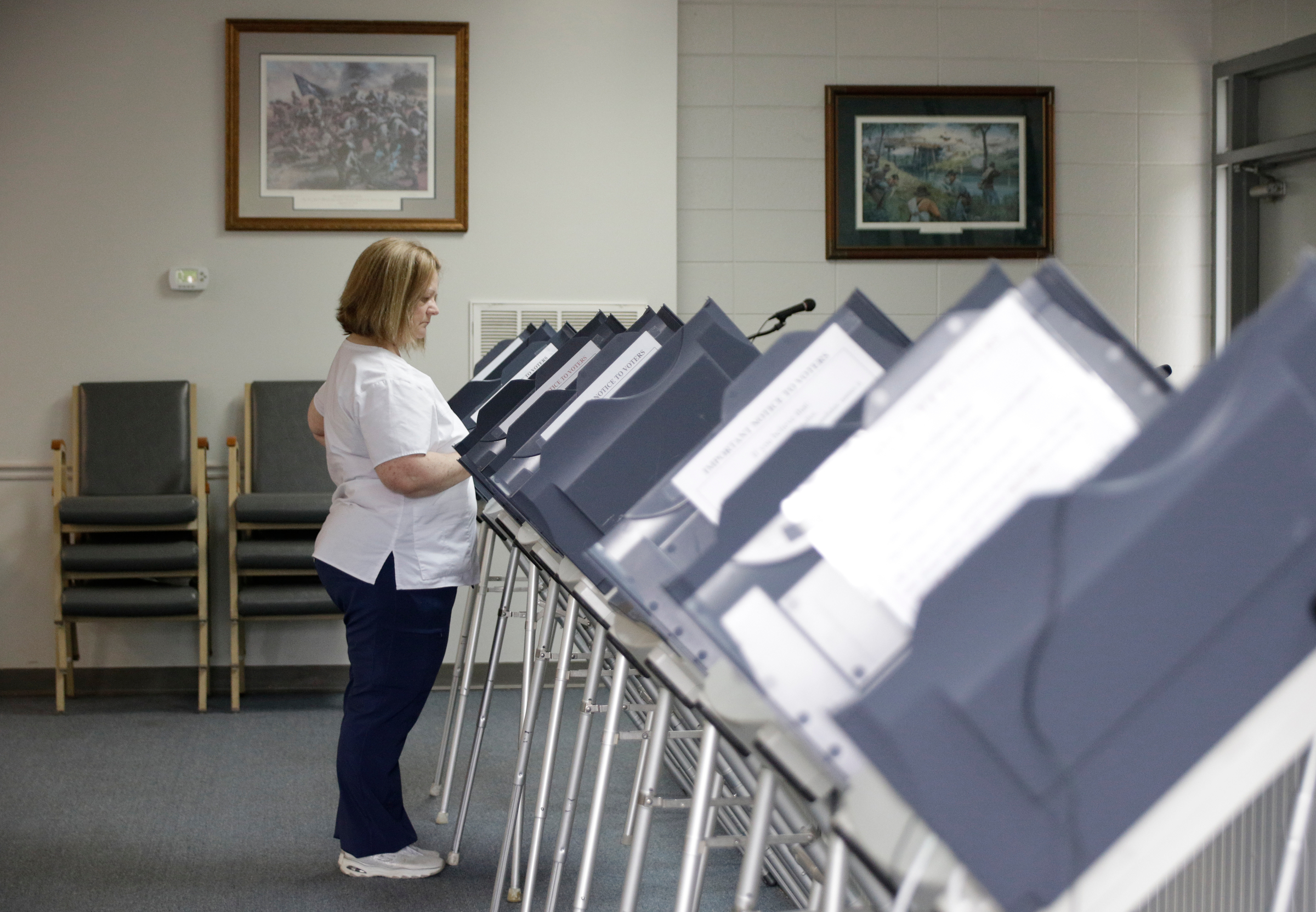 Donna Buchanan votes at the Chickamauga Civic Center on Tuesday, May 22, 2018, in Chickamauga, Ga. Turnout was steady at the polling place for Georgia's Tuesday primary election.