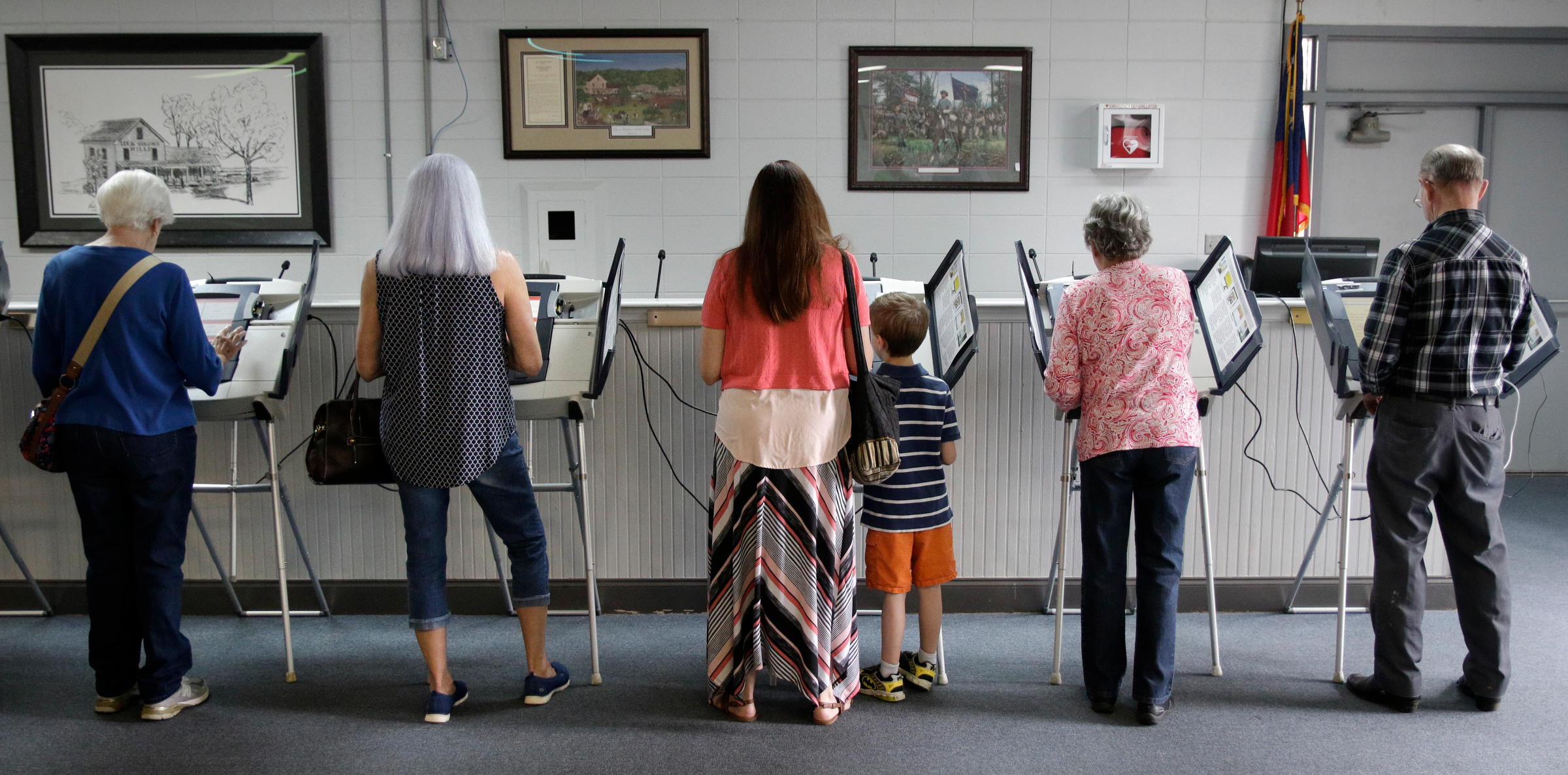 Voters cast their ballots at the Chickamauga Civic Center on Tuesday, May 22, 2018, in Chickamauga, Ga. Turnout was steady at the polling place for Georgia's Tuesday primary election.
