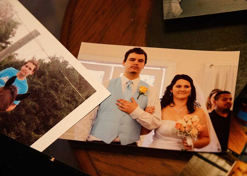 Photographs of Aaron Biddle is seen in his mother Samantha Baltazar's apartment on Thursday, Oct. 25, 2018, in Chattanooga, Tenn. Biddle was shot and killed outside of a Chattanooga duplex in May by Jadarius Knox. Baltazar says she wants to set the record straight about who her son was after courtroom portrayals represented him as a violent aggressor.