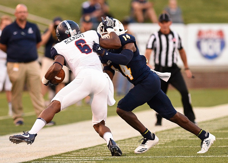 UTC defensive back Jordan Jones (14) forces Samford wide receiver Kelvin McKnight (6) out of bounds during the Mocs' home football game against the Samford Bulldogs at Finley Stadium on Saturday, Sept. 22, 2018, in Chattanooga, Tenn. 