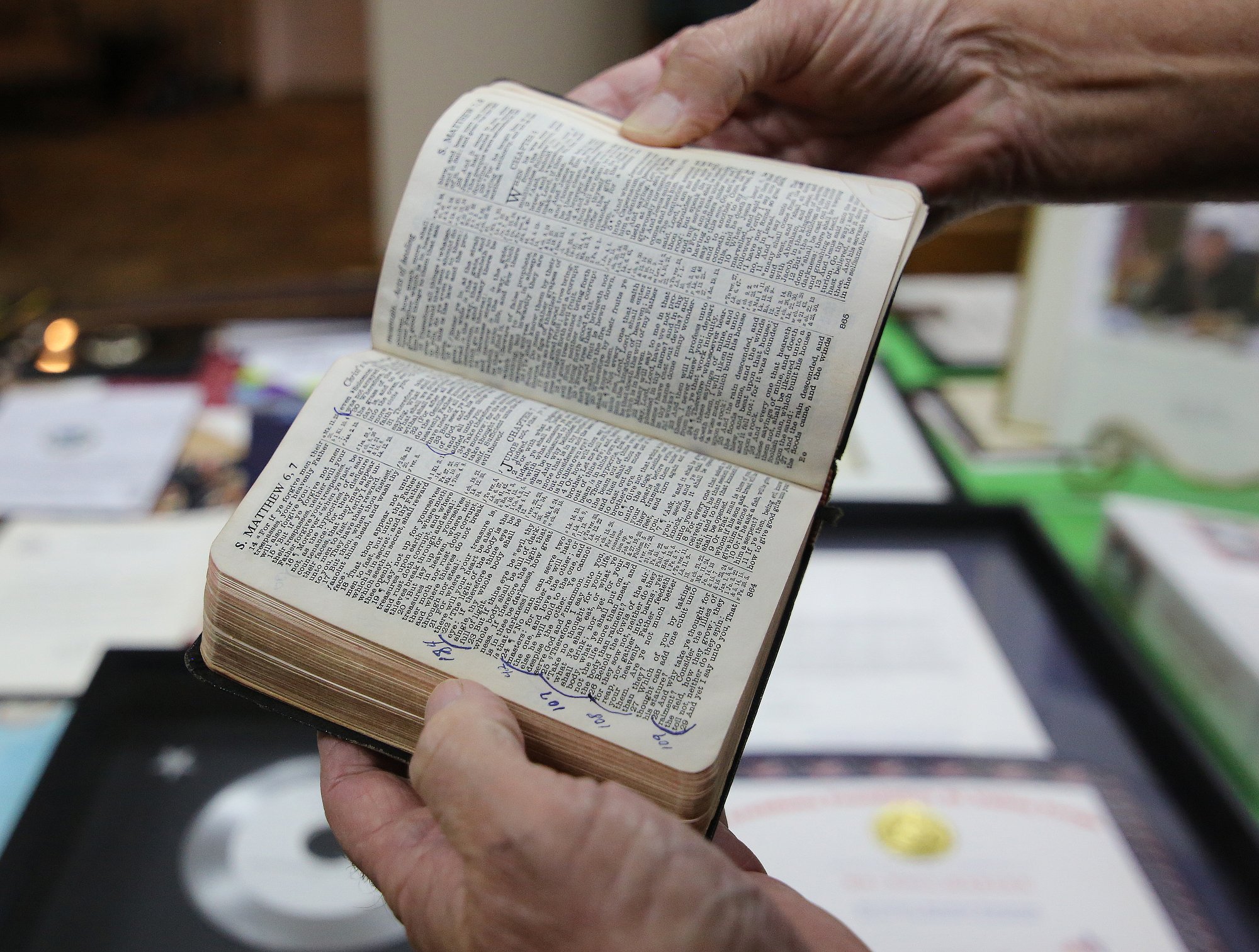 Philip George Garver shows off the Bible he carried while in the Vietnam War during an interview Wednesday, October 17, 2018 in Collegedale, Tennessee. Garver wrote numbers by verses to represent the day he was in Vietnam.