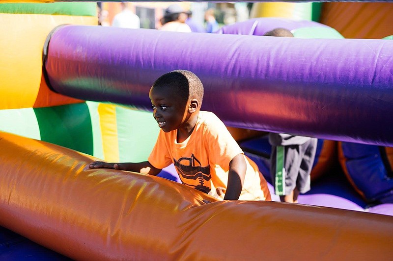 A bounce house will be among the children's activities.