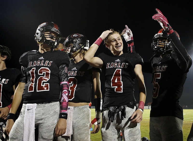 From left, Signal Mountain's Jack Wilson, Drew Lowry, Malone Howley and Travion Williams celebrate their home win over Brainerd on Sept. 28.
