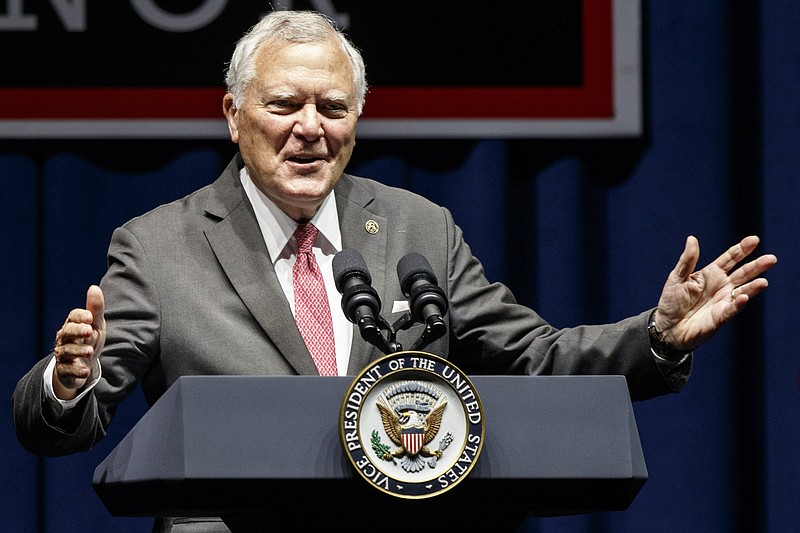Georgia Governor Nathan Deal campaigns for Republican gubernatorial candidate Brian Kemp during a "Get Out The Vote" rally at the Dalton Convention Center on Thursday, Nov. 1, 2018 in Dalton, Ga. Republican Brian Kemp is facing off against Democrat Stacey Abrams for governor in Georgia.